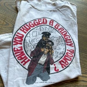 Hanes small retro vintage T-Shirt. Machine wash cold and hang dry.